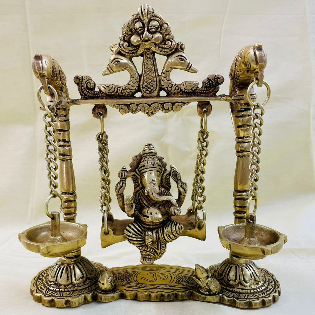 Premium brass Ganesha jhula with diyas for return gifts and pooja decor India