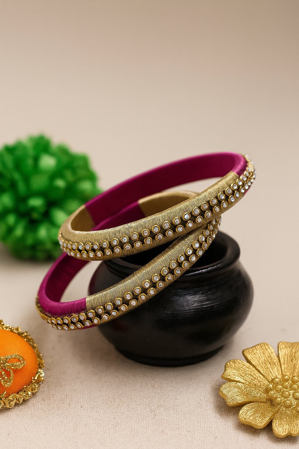 Silk thread bangles in pink and gold combination