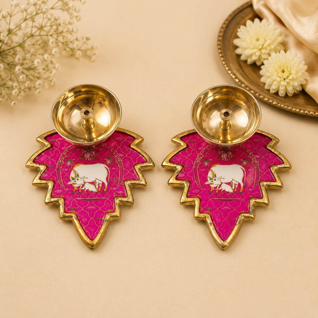 Decorative brass diya set with artistic base for Diwali decor and pooja rituals